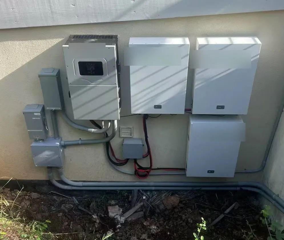 Side-yard residential battery and inverter installation