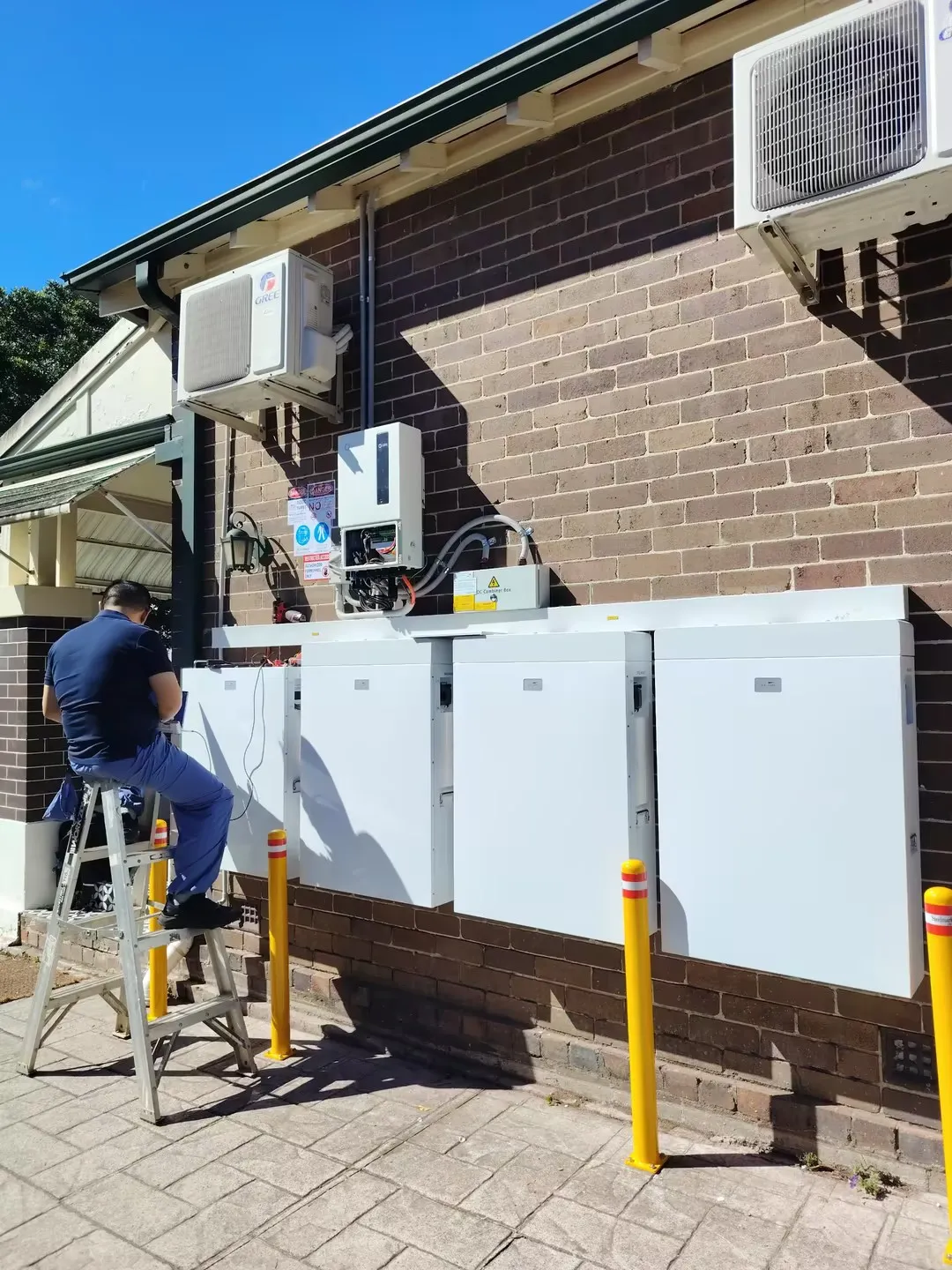 Savolture installer commissioning a residential LFP battery system