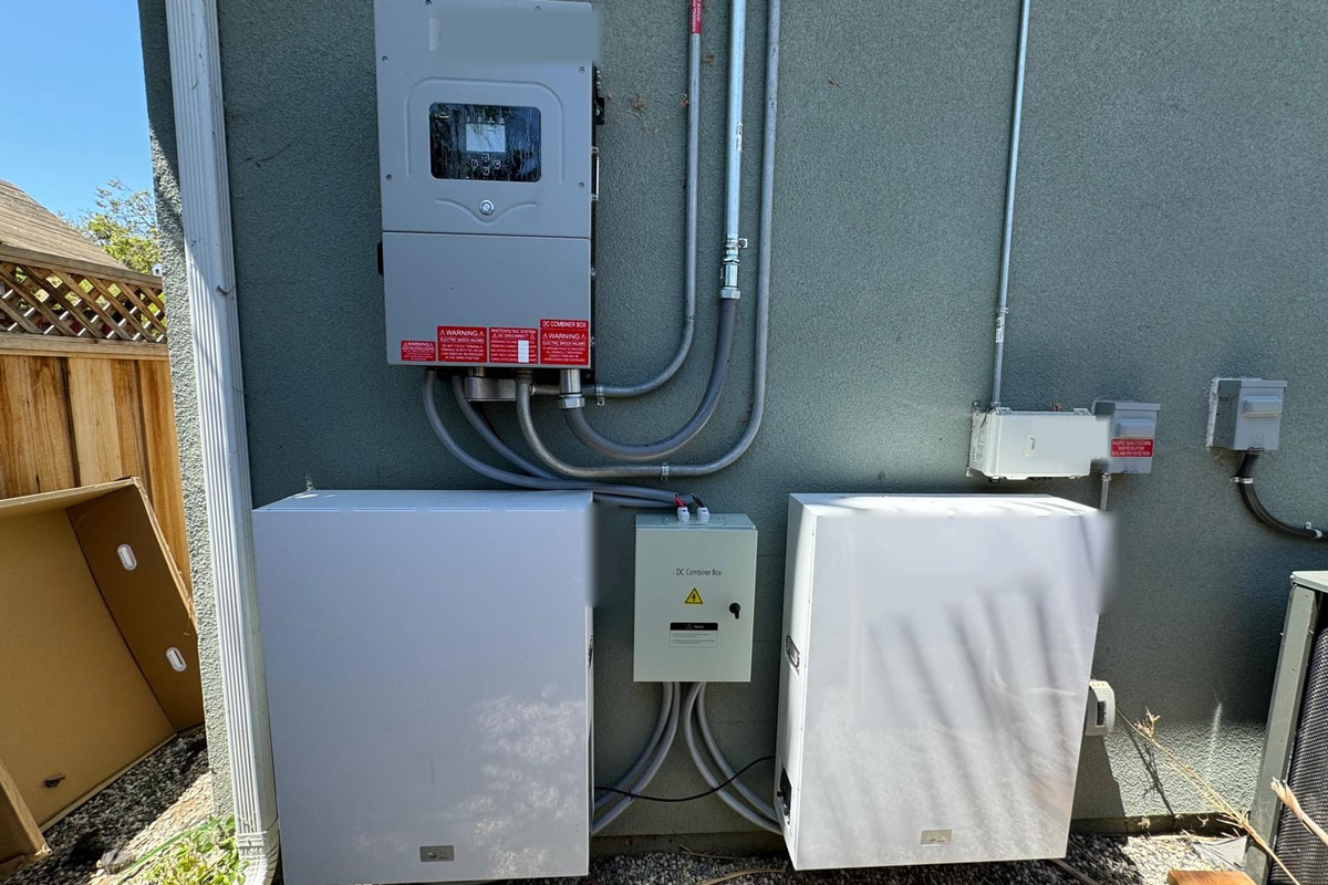 Outdoor residential wall battery and inverter installation